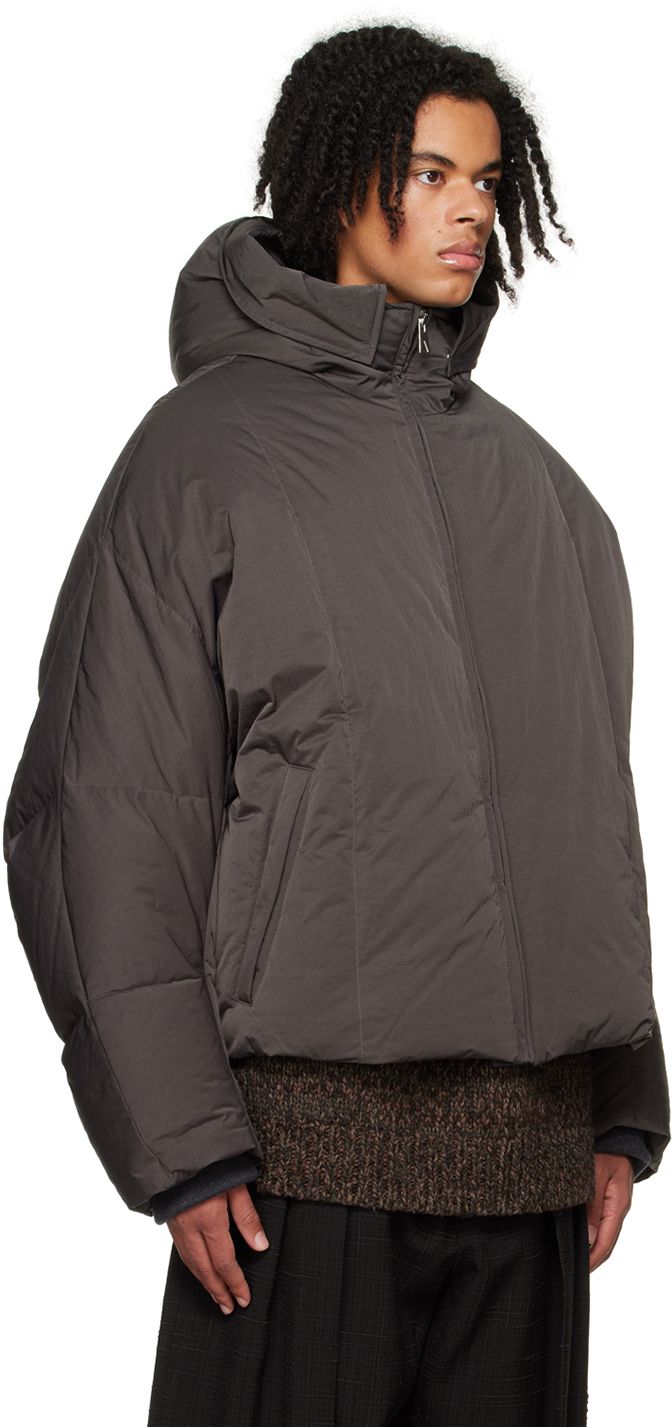 Down-filled quilted nylon taffeta jacket. · Brimmed hood · Stand collar · Zip closure · Welt pockets · Bungee-style drawstring at hem · Inset rib knit cuffs · Welt pocket at interior · Full taffeta lining Supplier color: Graphite Fill: 90% goose down, 10% goose feathers. Fall Hooded Quilted Jacket With Ribbed Cuffs, Hooded Duck Down Outerwear With Ribbed Cuffs, Hooded Nylon Puffer Jacket With Ribbed Cuffs, Winter Nylon Parka With Ribbed Cuffs, Winter Nylon Hooded Jacket With Ribbed Cuffs, Winter Hooded Nylon Jacket With Ribbed Cuffs, Fall Nylon Parka With Ribbed Cuffs, Taffeta Jacket, Goose Feathers