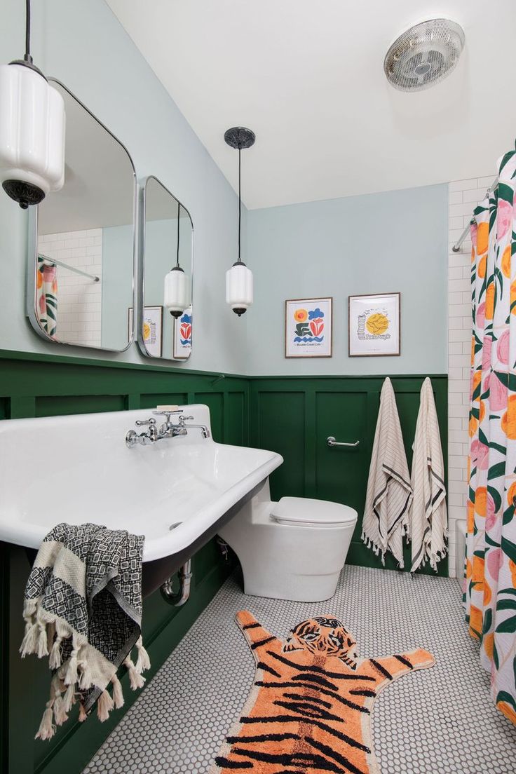 a bathroom with a tiger rug on the floor