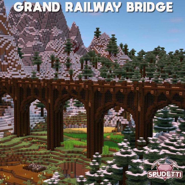 an image of a bridge that is made out of legos and has mountains in the background