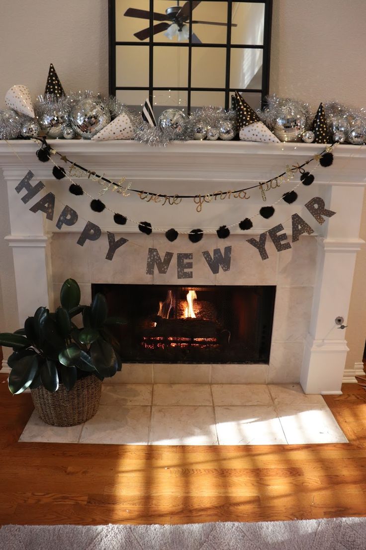 a fireplace with a happy new year banner above it