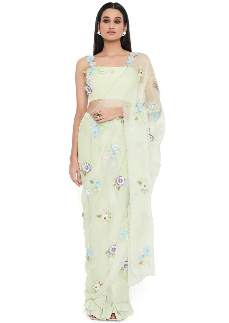 Mint crepe embroidered choli and pre-stitched saree with detachable embroidered pallu. Disclaimer: Since we are a made-to-measure brand and our dyeing process and embroidery are handcrafted, there may be slight variations in the color and embroidery of the actual product. The print placement may also vary from what is represented in the images shown on the product page. Anarkali Pre-draped Saree With Floral Embroidery For Navratri, Navratri Chanderi Pre-draped Saree With Floral Embroidery, Festival Floral Embroidery Pre-draped Saree, Pre-draped Tissue Silk Saree With Floral Embroidery, Eid Floral Embroidered Tissue Silk Pre-draped Saree, Floral Embroidered Chanderi Pre-draped Saree, Floral Embroidered Pre-draped Art Silk Saree, Chanderi Pre-draped Saree With Floral Embroidery, Designer Pre-draped Saree With Floral Embroidery