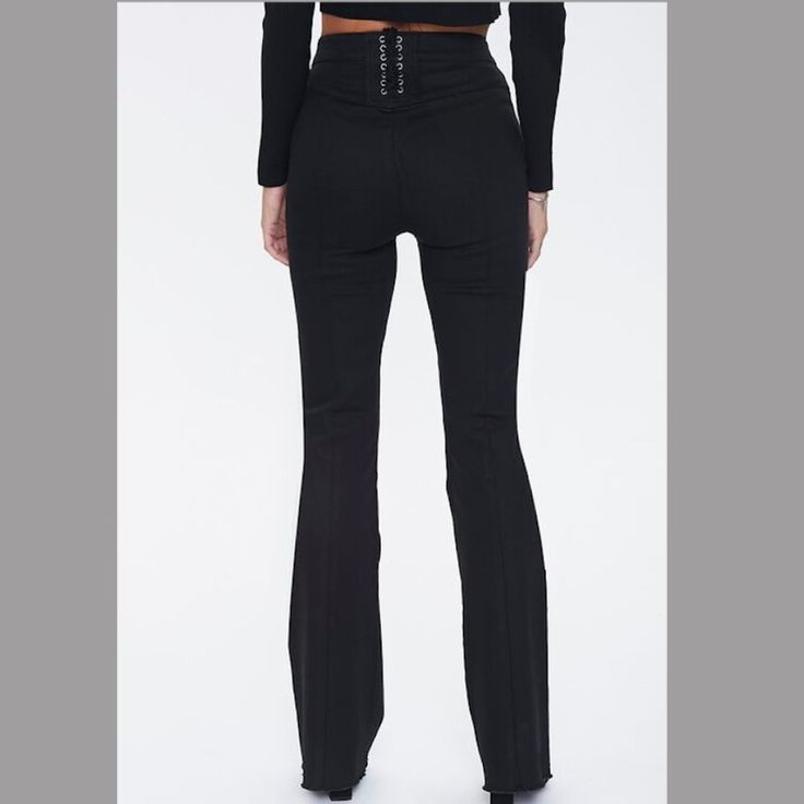 -Forever21 Lace Back Flare Jeans Black -Discontinued/Rare And Hard To Find -Nwt. No Flaws -Size: 30 In -69% Cotton, 30% Polyester, 1% Spandex -A Pair Of Jeans Featuring A Flare Leg, Slant Front Pockets, And A Lace-Up Back Design Fashion-forward Black Bottoms For Night Out, Edgy Black Bottoms From Forever 21, Edgy High Waist Bottoms From Forever 21, Forever 21 Fitted High Rise Bottoms, Forever 21 High Rise Fitted Bottoms, Edgy Fitted Bottoms From Forever 21, Forever 21 Bottoms For Date Night, Forever 21 Black Party Bottoms, Edgy Forever 21 Bottoms For Night Out