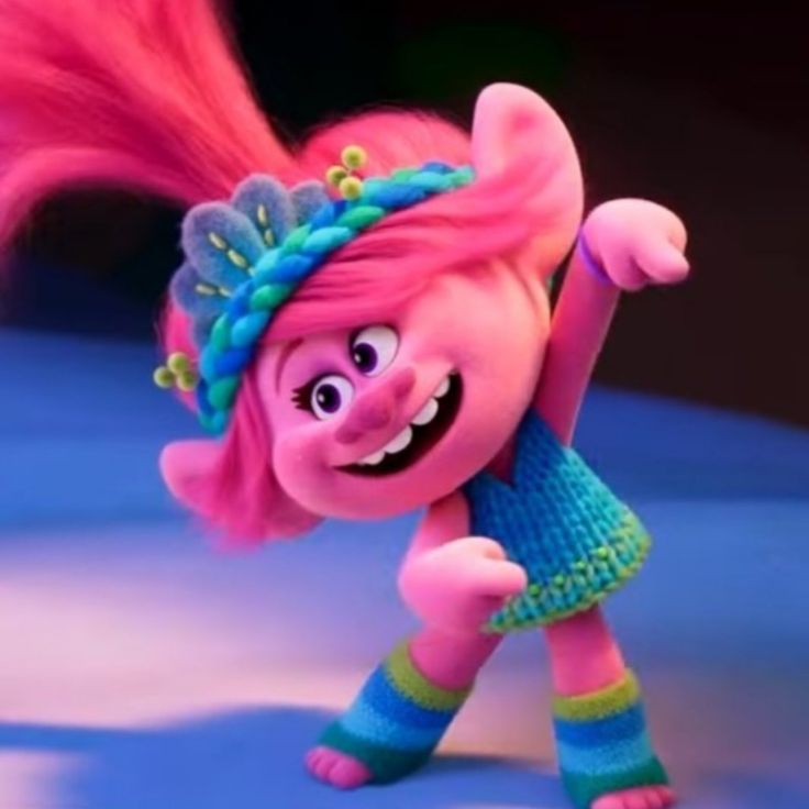 the pink troll is smiling and waving her hair in an animated scene from inside out