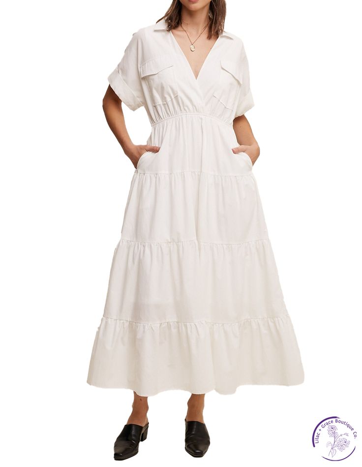 Feel effortlessly chic in our Collared Poplin Maxi Dress! The surplice neckline and tiered skirt add a touch of elegance, while the elastic waist and hidden side pockets provide practicality. With a lined design and clean hem, this dress is perfect for any occasion. Embrace comfort and style in this must-have dress! Material: 100% Cotton Chic White V-neck Tiered Dress, White V-neck Tiered Casual Dress, Chic Cotton Tiered Dress, Elegant Tiered Cotton Midi Dress, Elegant V-neck Tiered Dress For Day Out, Cotton Tiered V-neck Dress With Ruffle Hem, Cotton V-neck Dress With Gathered Waist, Summer Workwear Dresses With Elastic Waistband, Spring Tiered Skirt Dress With Pockets