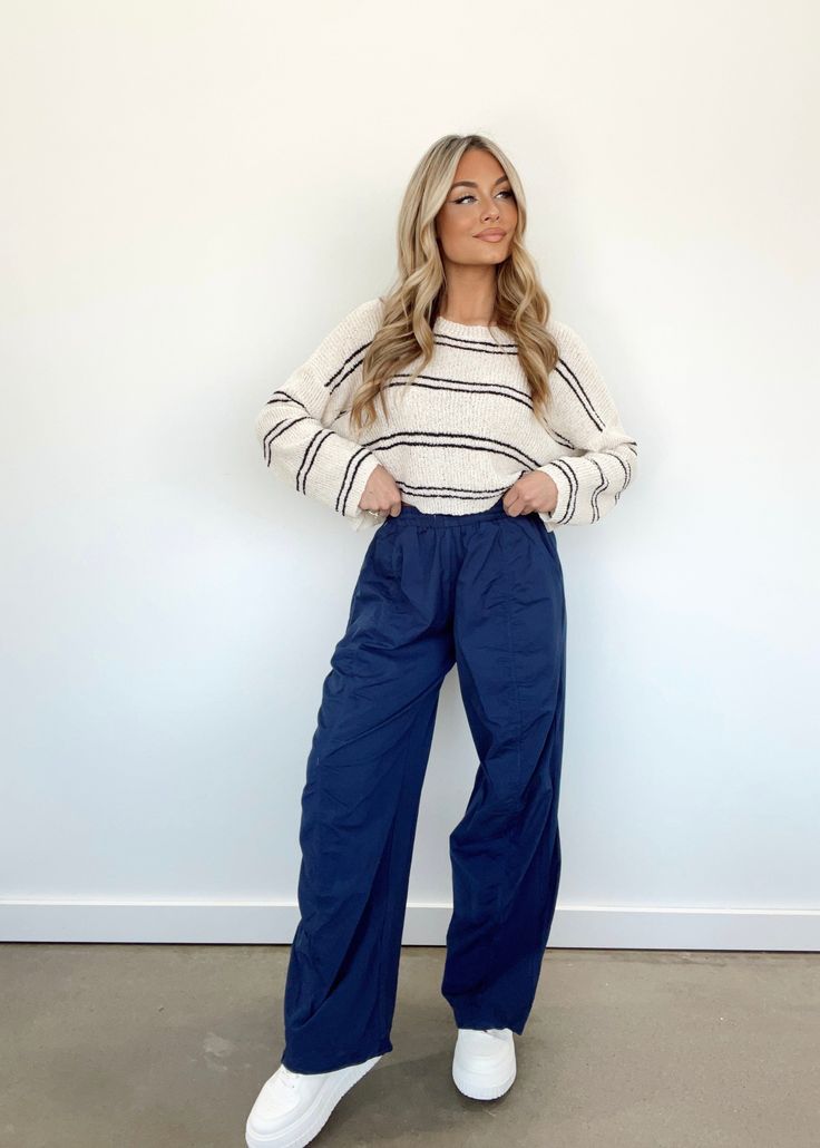 Introducing our On Board Cargo Pants, a flawless combination of luxury and functionality. These high waisted pants feature a stretchy drawstring waistband for a perfect fit, cargo pocket details, and a relaxed fit for optimum comfort. From running errands to a night out, these versatile pants will elevate your style while keeping you effortlessly in trend. Self 60% Cotton 40% Polyester Hand wash cold. Versatile Pants, Cargo Pocket, Rib Cage, Drawstring Waistband, Pocket Detail, On Board, High Waisted Pants, Dresses Xs, Running Errands