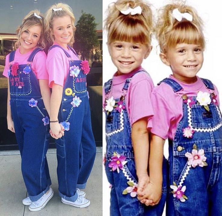 two girls in overalls and pink shirts standing next to each other