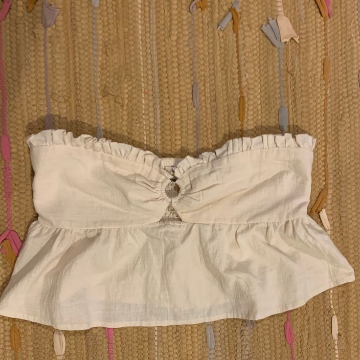 Pacsun Crop Top. Cream Color. Never Worn Was Too Big On Me Spring Vacation Bandeau Crop Top, Spring Vacation Bandeau Tops, Bandeau Tops For Summer Vacation, Summer Bandeau Tops For Vacation, Summer Bandeau Top For Beachwear, Summer Bandeau Top For Day Out, Bandeau Top For Vacation In Summer, Spring Bandeau Top For Beach, Spring Beach Bandeau Top