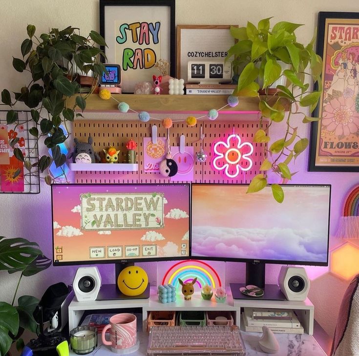 a desk with two computer monitors and a keyboard on it, surrounded by other office supplies