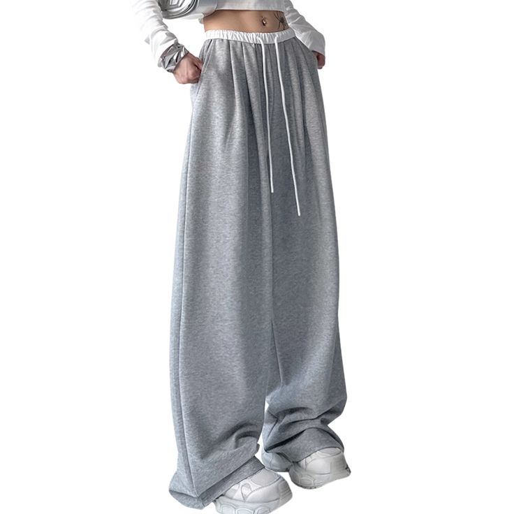 These Women’s Classic Drawstring Sweatpants offer a luxurious blend of comfort and style. Designed with a hint of modern sophistication, their lightweight fabric is tailored to provide a flattering silhouette and a snug fit. Featuring an adjustable drawstring waistband and side pockets, these sweatpants will be a timeless chic addition to any wardrobe. Features: -80% Cotton.20% Polyester -Mid-rise Waist -Solid Color -Straight Leg -Regural Fit -Classic Style Full Length Drawstring Bottoms For Leisure, Loosely Fitted Full Length Sweatpants With Drawstring, Full Length Drawstring Sweatpants, Baggy Full-length Drawstring Sweatpants, Winter Stretch Bottoms With Drawstring, Winter Full Length Bottoms With Drawstring, Winter Full-length Pants With Drawstring, Winter Drawstring Full-length Pants, Winter Drawstring Full Length Pants