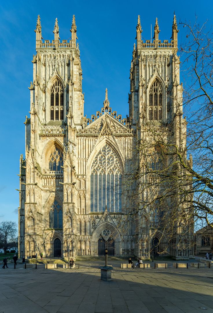 the large cathedral has many windows on it