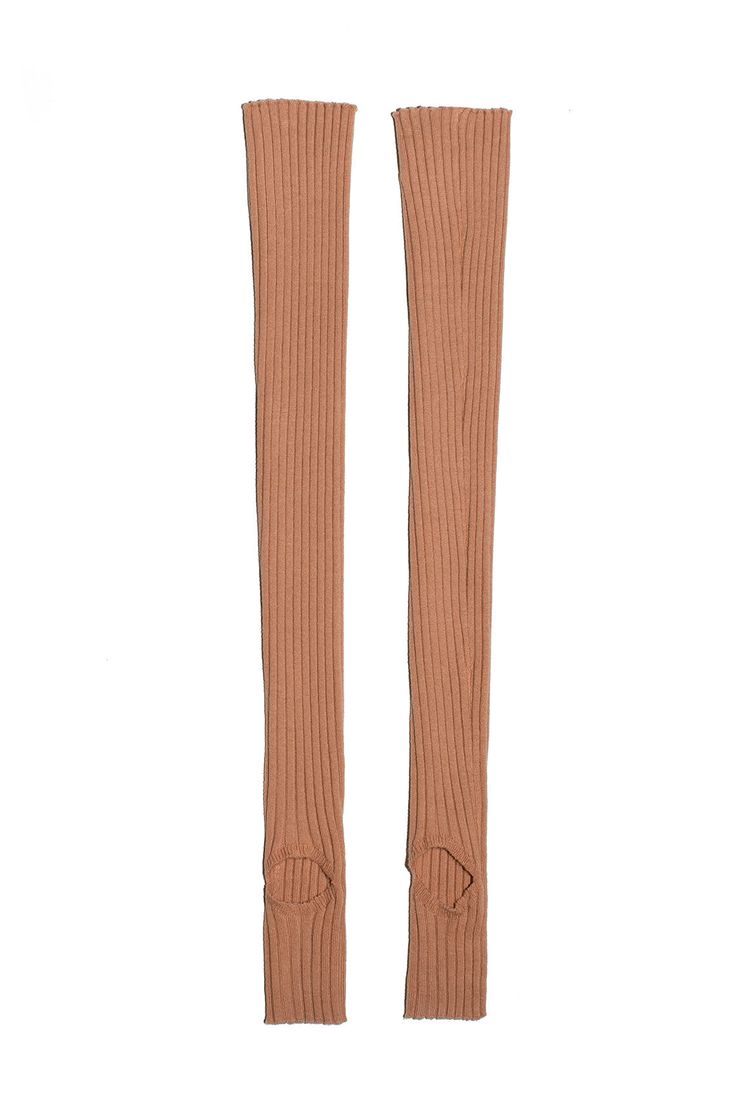 Open toe and heel legwarmer in a stretchy, fitted ribbed knit. Fabric is 80% cotton,18% nylon, and 2% lycra. Fitted Footless Knee-high Socks, Fitted Solid Ribbed Leggings, Fitted Solid Color Ribbed Leggings, Solid Color Fitted Ribbed Leggings, Ribbed Tight Bottoms For Winter, Tight Ribbed Winter Bottoms, Tight Ribbed Bottoms For Winter, Fall Full-length Ribbed Leggings, Solid Stretch Ribbed Leg Warmers