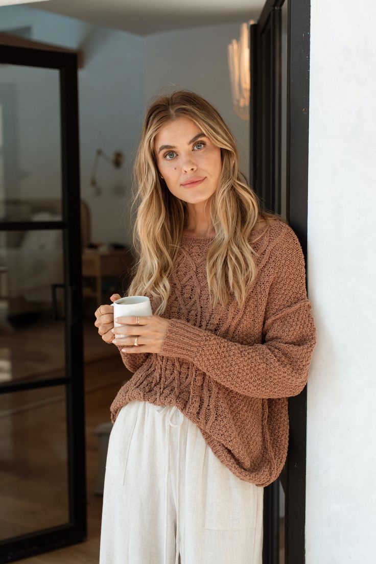 The Renata Sweater: the ultimate blend of softness and style. This plushy soft sweater is the perfect transitional piece, offering just the right amount of warmth without being too thick or too lightweight. Whether worn alone or over your favorite tank or bathing suit, this roomy sweater ensures you stay comfy and chic all season long. Montecito Collection FIT Roomy Fit Reverse Seam Plush Soft Cable Knit Britt is 5'9 Wearing Size Small/Medium Anna is 5'10 Wearing Size Small/Medium SMALL/MEDIUM M Comfortable Fall Sweater With Soft Texture, Soft Textured Long Sleeve Sweater For Cold Weather, Long Sleeve Sweater For Cold Weather With Soft Texture, Casual Snug Sweater With Soft Texture, Comfy Long Sleeve Sweater For Cold Weather, Cozy Sweater With Soft Texture, Oversized Sweater For Cold Weather With Soft Texture, Cozy Cable Knit Sweater For Loungewear, Comfy Winter Sweater With Soft Texture