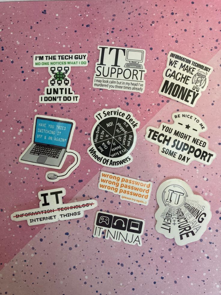 various stickers on the back of a pink laptop computer case with words and symbols