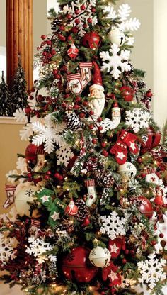 a christmas tree decorated with red and white ornaments