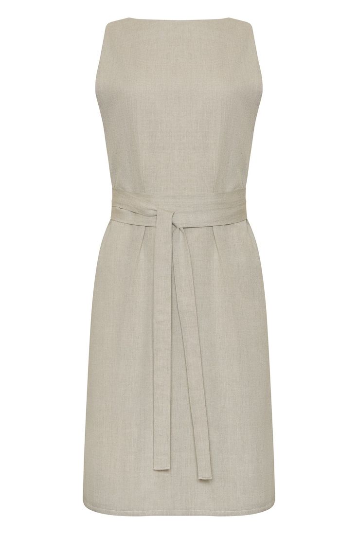 The elegant Isabelle wrap dress is crafted from 100% certified organic cotton. The fabric has a luxurious, soft feel to it and is cut to a beautiful, contemporary shape. It features a long sash belt that brings the waist in, which, along with the subtle A-line shape through the skirt, creates a flattering silhouette.The dress is available in two colours: beige and black. Both are incredibly versatile but look perfect when layered over a plain, long-sleeved cotton top. The dress is finished with Classic Beige Dresses With Pleated Waist, Classic Beige Dress With Pleated Waist, Elegant Cream Linen Midi Dress, Fitted Belted Linen Dress For Daywear, Elegant Midi Dress With Tie Fastening, Elegant Tie Waist Dress For Daywear, Elegant Daywear Dress With Tie Waist, Elegant Dresses With Natural Waistline For Daytime, Elegant Dresses For Daywear