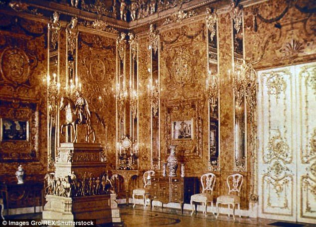 an ornately decorated room with chandeliers and chairs