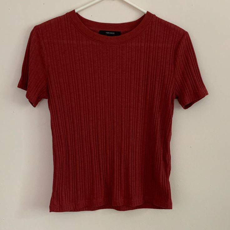 Size: Small Color: Darker Shade Of Red Never Worn, In Very Good Condition This Is From Forever 21. Super Comfortable And The Front Of The Top Looks Cute When It’s Tied In A Knot!! Red Crew Neck Trendy Tops, Trendy Red Crew Neck Top, Red Ribbed Casual Top, Casual Red Ribbed Top, Forever 21 Crew Neck Tops, Trendy Ribbed Tops From Forever 21, Forever 21 Fitted Crew Neck Top, Red Ribbed Summer Top, Casual Short Sleeve T-shirt By Forever 21