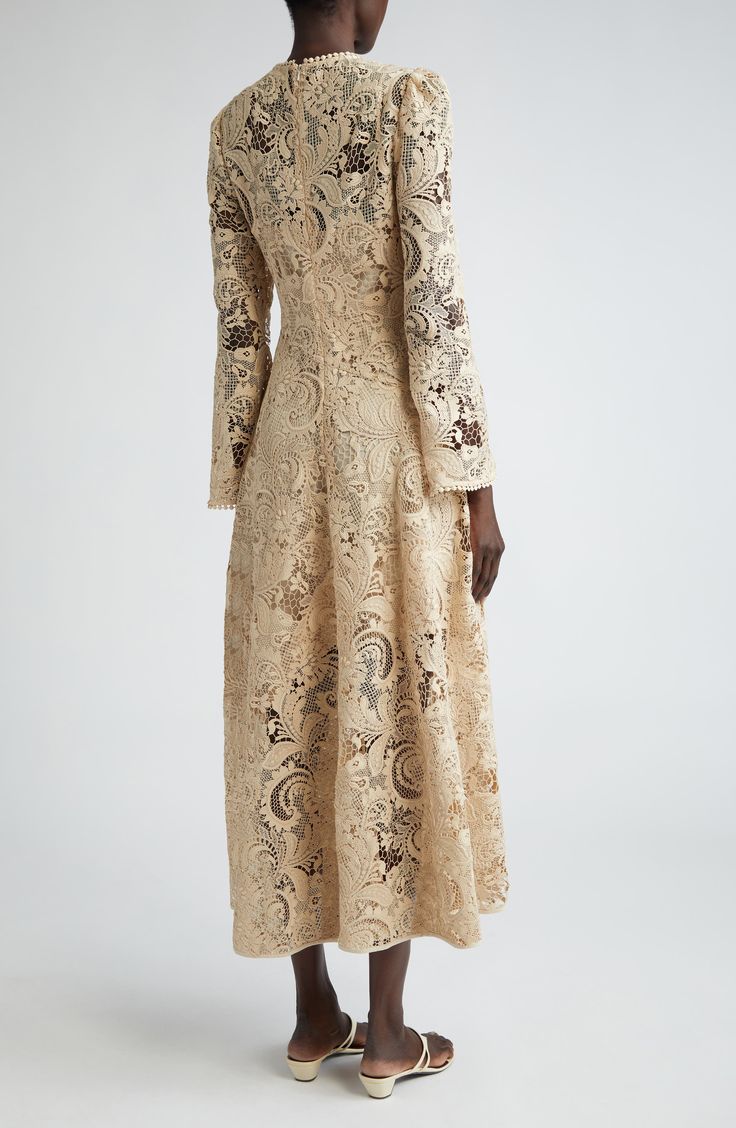 Cream Lace Long Sleeve Midi Dress, Beige Long Sleeve Lace Midi Dress, Luxury Long Sleeve Midi Dress For Wedding, Cream Long Sleeve Midi Dress With Lace Trim, Long Sleeve Beige Lace Dress With Patchwork, Beige Long Sleeve Lace Dress With Patchwork, Beige Lace Patchwork Evening Dress, Cream Lace Midi Length Evening Dress, Cream Lace Midi Dress For Evening