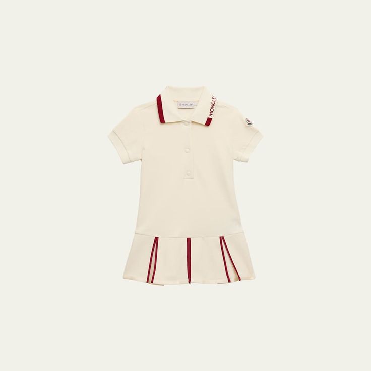 Moncler polo dress defined by pleats and contrast trim Spread collar with logo embroidery Three-button placket Short sleeves A-line silhouette Slipover style Polyester/elastane Machine wash warm Made in Portugal Classic White Dress With Placket, Classic White Polo Dress For Spring, Preppy Fitted Collared Dress, White Short Sleeve Dress With Pleated Hem, Luxury Short Sleeve Shirt With Patch Pockets, Preppy White Collared Dress, White Short Sleeve Tennis Dress, Preppy Collared White Dress, White Fitted Classic Polo Dress