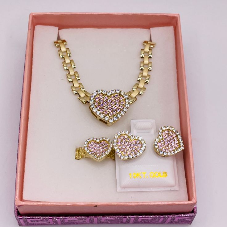 As seen on our instagram page. This set includes a 5mm 16" 10K Gold RX chain with a 10K gold Pink cubic zirconia Heart Ring and matching 10K Gold cubic zirconia Heart Earrings. To complete the set the chain will be mounted with a sliding 10K gold pink heart charm. We will reach out to you for ring size after order is placed. Custom Gold Jewelry, Xoxo Jewelry, California Jewelry, Dope Jewelry Accessories, Heart Shaped Pendant Necklace, Picture Pendant, Initial Earrings, Bamboo Earrings, Jewelry Accessories Ideas