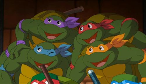 the teenage mutant turtles are lined up in a row and ready to be watched by their parents