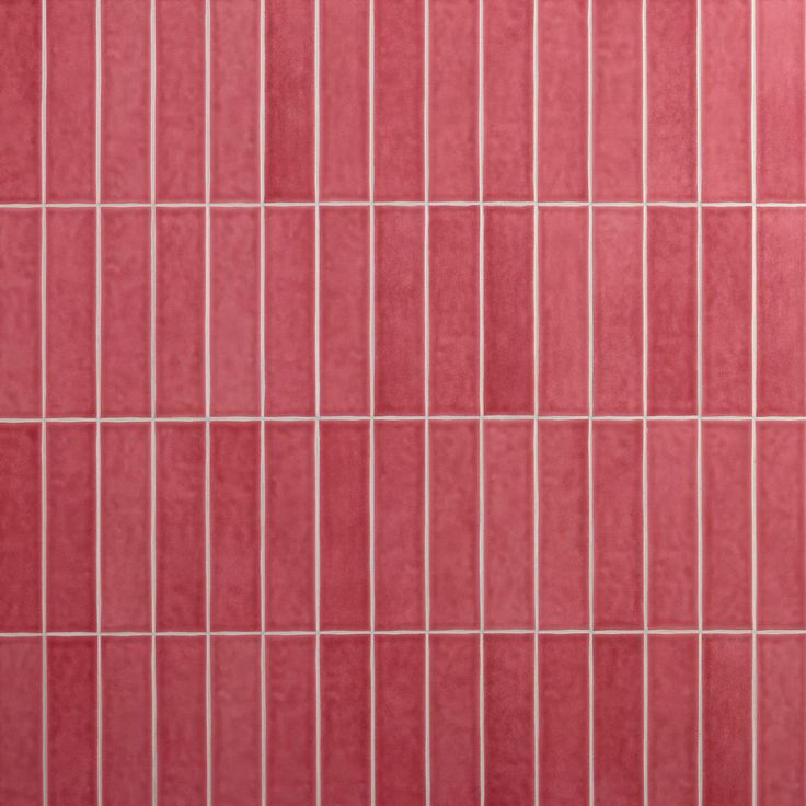 a red tiled wall with white lines on it