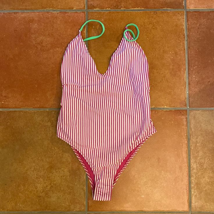 Brand New Never Worn, Tags Still Attached. Super Cute Striped, Low Back, High Cut Swimsuit. Stripes Are Pink And White With Green Straps. Size: Small Pink V-neck One Piece Beachwear, Casual Pink V-neck Swimwear, Pink V-neck Bodysuit With Lined Body, Pink Summer One-piece Swimsuit For Pool, Pink One-piece Swimsuit For Beach Season, Pink Summer One-piece For Pool, Pink Stretch Vacation Swimsuit, Pink Stretch One Piece For Vacation, Pink Stretch One-piece Swimsuit For Vacation