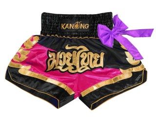 a black and red boxing shorts with gold lettering on the side, tied to a yellow ribbon