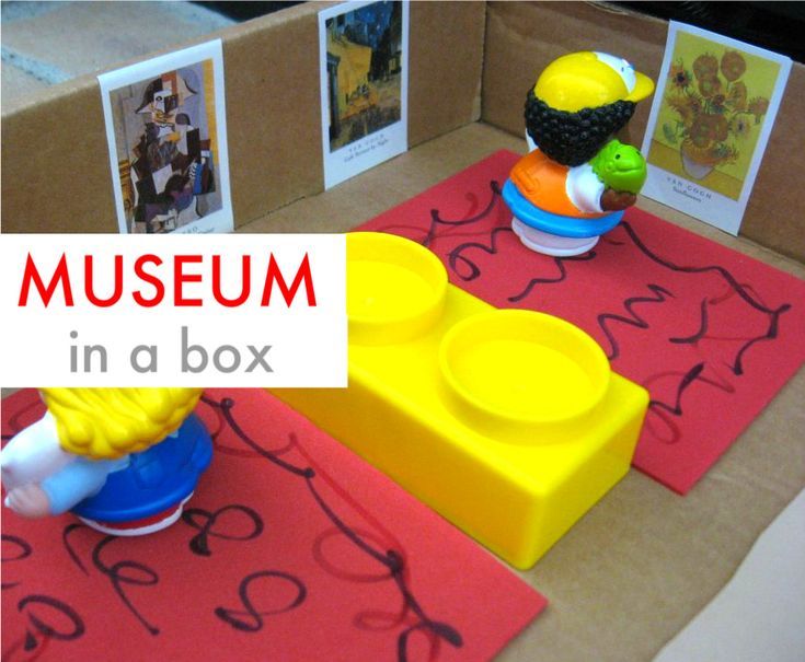 there is a fake museum in a box with pictures on the walls and around it