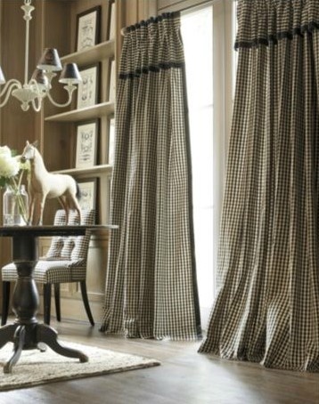 a living room with black and white checkered curtains