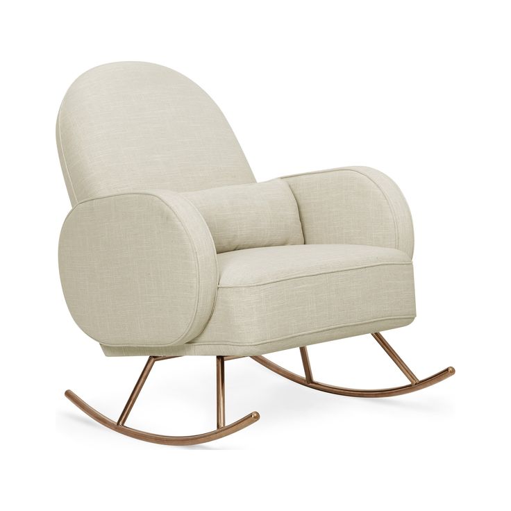 a white rocking chair with wooden legs and a beige fabric upholstered backrest