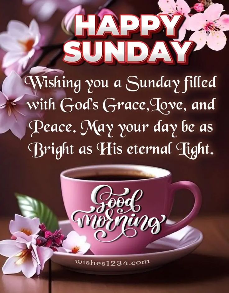 a cup of coffee sitting on top of a wooden table next to pink flowers and the words happy sunday