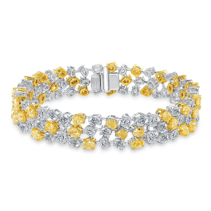 Beautiful white and yellow gold bracelet, made with three rows of oval, round, pear and cushion shapes Fancy Yellow and White Diamonds totaling 14.21carats. 14.21ct t.w. yellow and white diamonds 18karat white & yellow gold 7 inches long Luxury Yellow Bracelets For Formal Occasions, Fine Jewelry Yellow Bracelets For Anniversary, Luxury Yellow Gold Diamond Party Bracelet, Luxury Yellow Fine Jewelry Bracelets, Canary Yellow Diamond Bracelet, Yellow Jewelry, Yellow Citrine, Yellow Gold Bracelet, Diamonds And Gold