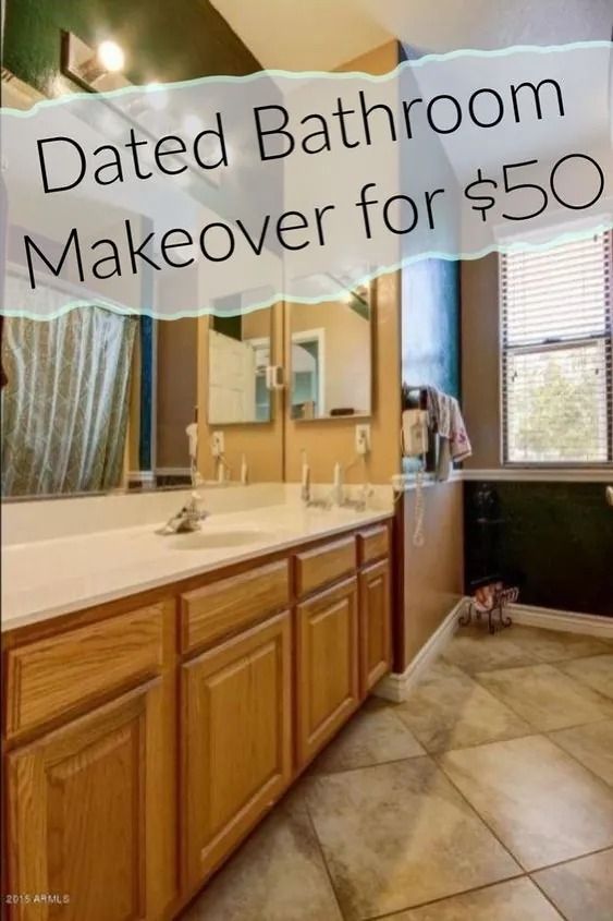 a bathroom with wooden cabinets and tile flooring that has the words, dated bathroom makeover for $ 50