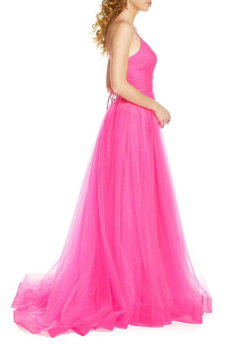 Ethereal tulle in a vivid shade of pink makes this floor-sweeping gown one that will never sit out a danceable song. Style Name:La Femme Neon Light Tulle Gown. Style Number: 5982252. Pink Floor-length Gown For Debutante Ball, Pink Floor-length Evening Dress For Debutante Ball, Pink Tulle Gown For Prom Season, Pink Tulle Ball Gown With Tulle Skirt, Pink Tulle Ball Gown For Prom Season, Pink Tulle Gown With Sweep Train, Pink Evening Dress With Sheer Bodice For Debutante Ball, Pink Tulle Evening Dress For Gala, Pink Tulle Ball Gown With Sweep Train