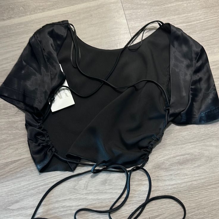 Black New With Tags Crop Top From Zara Open Back So Cute Black Tops For Going Out In Spring, Black Crop Top For Spring Evening, Black Crop Top For Summer Date Night, Black Crop Top For Summer Night Out, Zara Summer Crop Top For Date Night, Chic Black Crop Top, Elegant Black Crop Top For Spring, Black Crop Top For Date Night In Summer, Black Crop Top For Spring