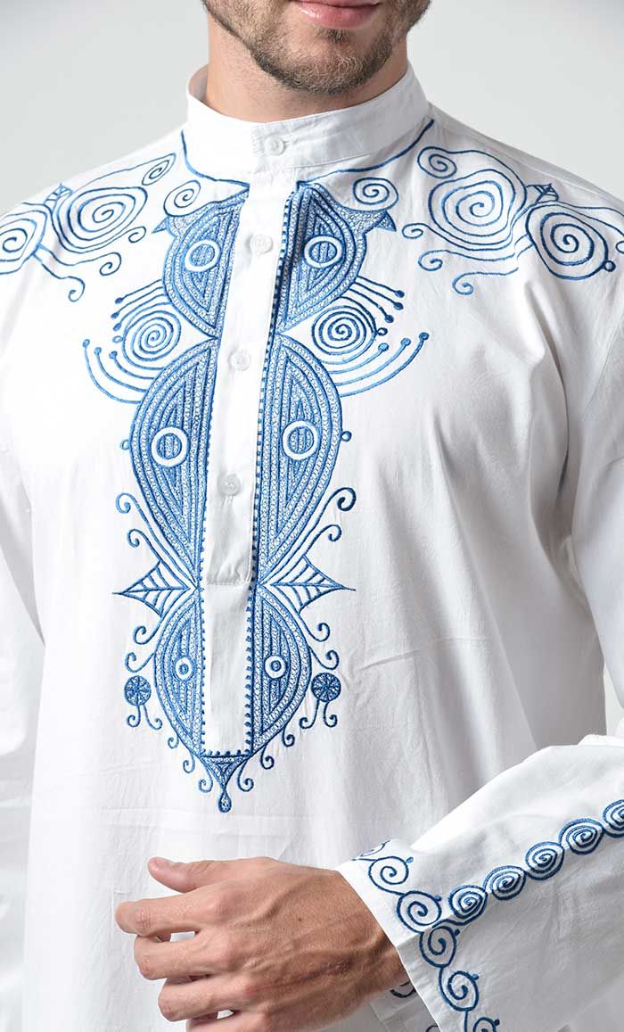 Fabric is 100% cotton Poplin Front button down Mandarin collar Front yoke and sleeves embroidered Length is 42-44" Side Pockets Machine wash cold with like colors and tumble dry Traditional Long Sleeve Kurta With Embroidered Cuffs, Cotton Kurta With Embroidered Cuffs Long Sleeve, Cotton Kurta With Embroidered Cuffs, Spring Kurta With Embroidered Cuffs And Long Sleeves, Spring Long Sleeve Kurta With Embroidered Cuffs, White Cotton Shirt With Embroidered Cuffs, Casual Long Sleeve Embroidered Kurta, Cotton Long Sleeve Shirt With Intricate Embroidery, Long Sleeve Cotton Shirt With Intricate Embroidery