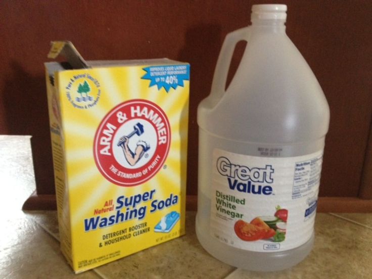 a gallon of great value washing soda next to a carton of laundry deterant