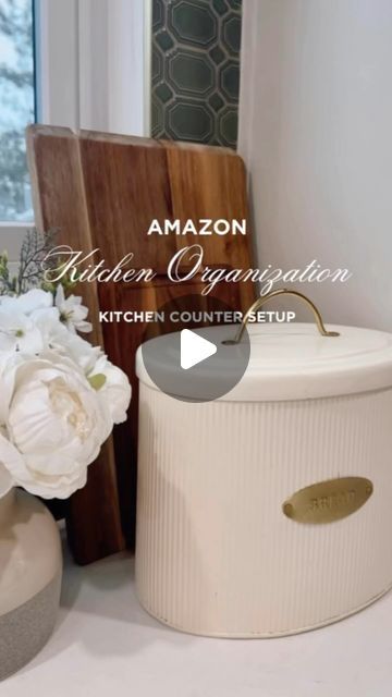 the kitchen organization kit is next to a vase with flowers