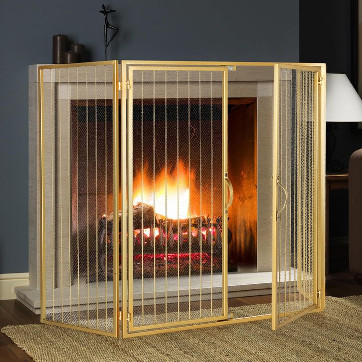 an open fireplace with a fire in it