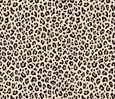 an animal print pattern with black and white spots