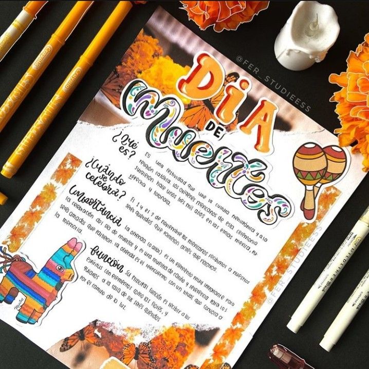 a menu with pencils, markers and other items on the table next to it