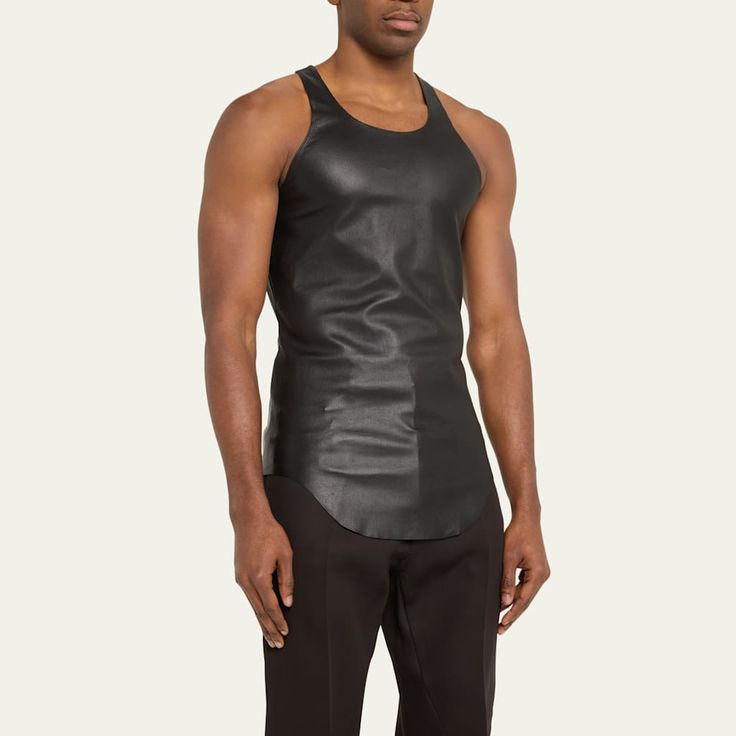 Rick Owens tank top in solid stretch leather Scoop neckline Sleeveless Slim fit Shirttail hem Pullover style Leather/cotton/spandex Professional cleaning recommended Made in Italy Fitted Leather Casual Vest, Casual Fitted Leather Vest, Casual Leather Sleeveless Vest, Black Leather Sleeveless Top, Fitted Leather Casual Top, Fitted Leather Sleeveless Vest, Fitted Leather Top Casual Style, Leather Tank Top, Rick Owens Men