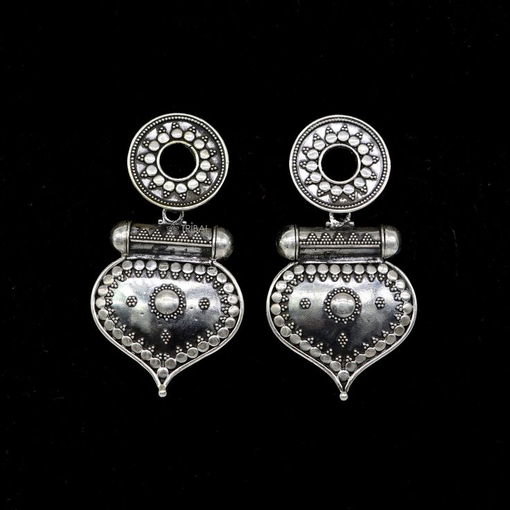 925 sterling silver handmade gorgeous stud earrings drop dangle vintage antique design earrings belly dance tribal jewelry from Rajasthan India. Metal-925 sterling silver. Type-drop dangler earrings. Length-6.2 centimetre approx. Width-3.2 centimetres approx. Weight-28.060 grams. Marking-925 closure-push back. Makes excellent gifting and collectible pieces. Antique Silver Elegant Jewelry For Festivals, Elegant Antique Silver Jewelry For Festivals, Sterling Silver Drop Earrings With Intricate Design, Traditional Silver Dangle Jewelry, Silver Traditional Pierced Bridal Earrings, Traditional Sterling Silver Dangle Earrings, Traditional Sterling Silver Dangle Jewelry, Festival Drop Earrings With Oxidized Finish, Elegant Sterling Silver Danglers With Oxidized Finish