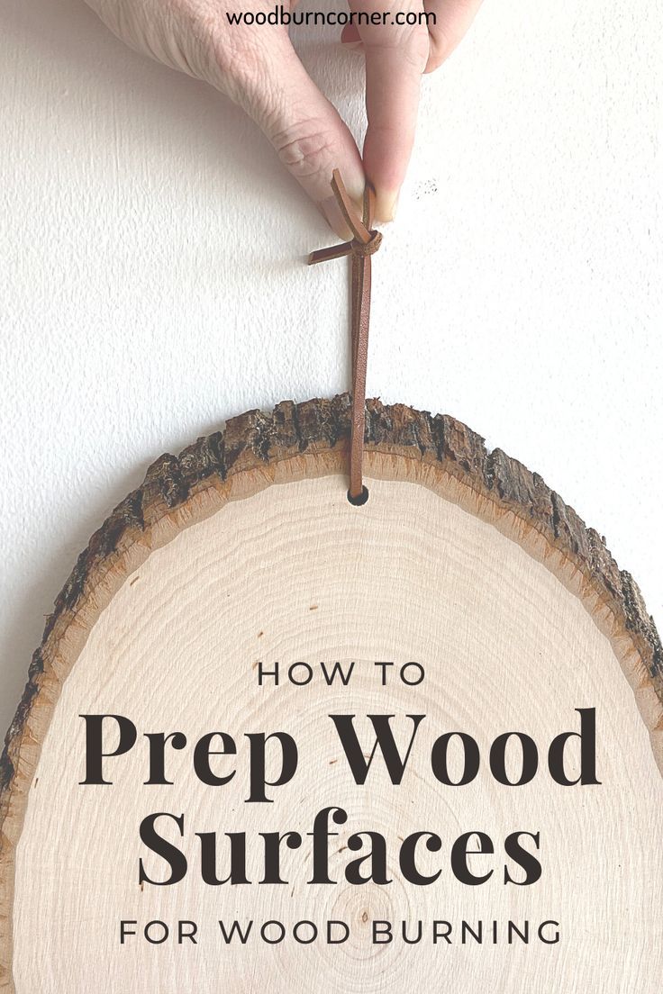 a person holding a piece of wood with the words how to prep wood surfaces for wood burning