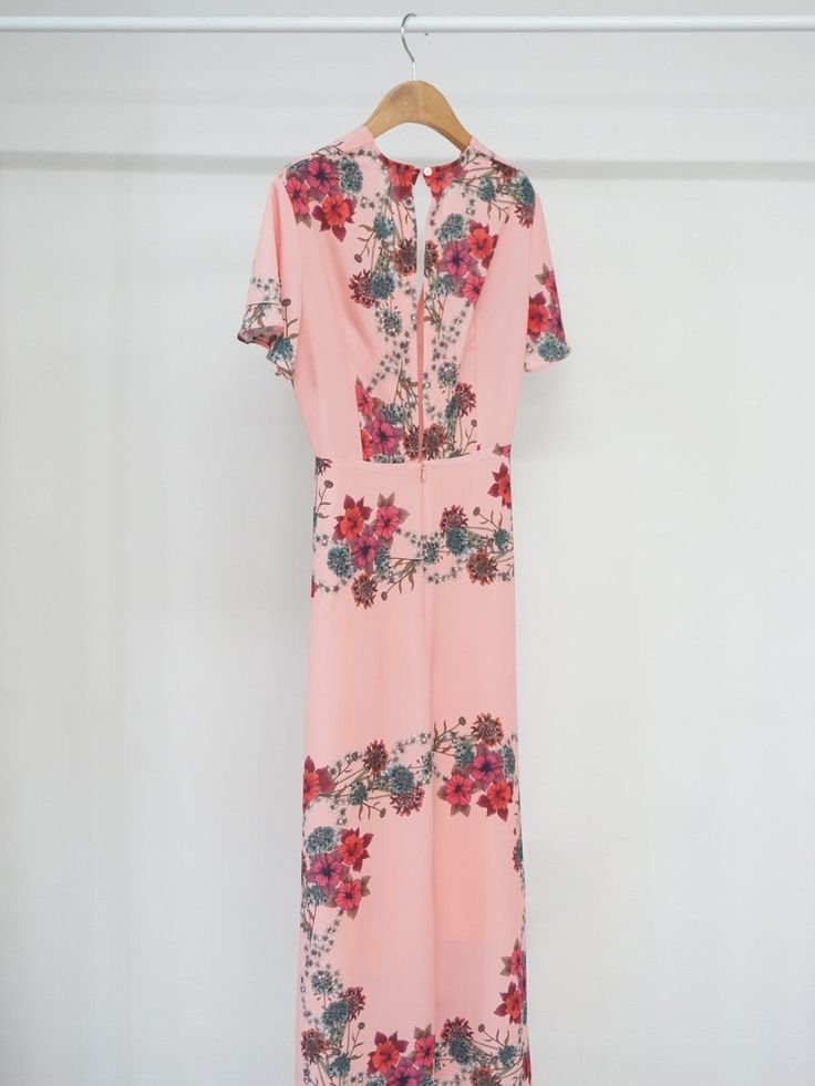 Maxi length V neck dress with short sleeve and pink floral print. Silky satin like material feel. Model is in MINUSEY S. * MINUSEY S = EU 34, US 2* MINUSEY M = EU 36, US 4* 100% Polyester* Dry clean* Made in Korea - Model Height: 170cm/5'7" (US2, EU34) Pink Floral Print V-neck Maxi Dress, Feminine Pink Printed Floral Dress, Feminine Pink Floral Printed Dress, Short Sleeve Floral Dress With Rose Print For Spring, Summer Floral Dress With Rose Print And Short Sleeves, Pink V-neck Maxi Dress With Floral Print, Short Sleeve Floral Dress With Rose Print For Summer, Feminine Floral Print Short Sleeve Maxi Dress, Pink Printed Maxi Floral Dress