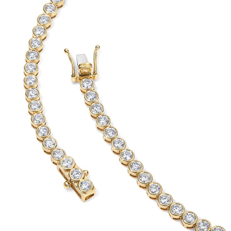 The bezel set round diamond necklace is the perfect statement piece and make a great addition to any outfit! Available in 14K Yellow Gold and White Gold Diamond quality = GH-Color, SI-Clarity Necklace length options: 15in = 8.80 carats 16in = 9.28 carats Round Diamond Necklace, Diamond Cocktail Rings, Tennis Necklace, Band Bracelet, Diamond Shop, Bracelet Collection, Earrings Collection, Ring Collections, Necklace Length