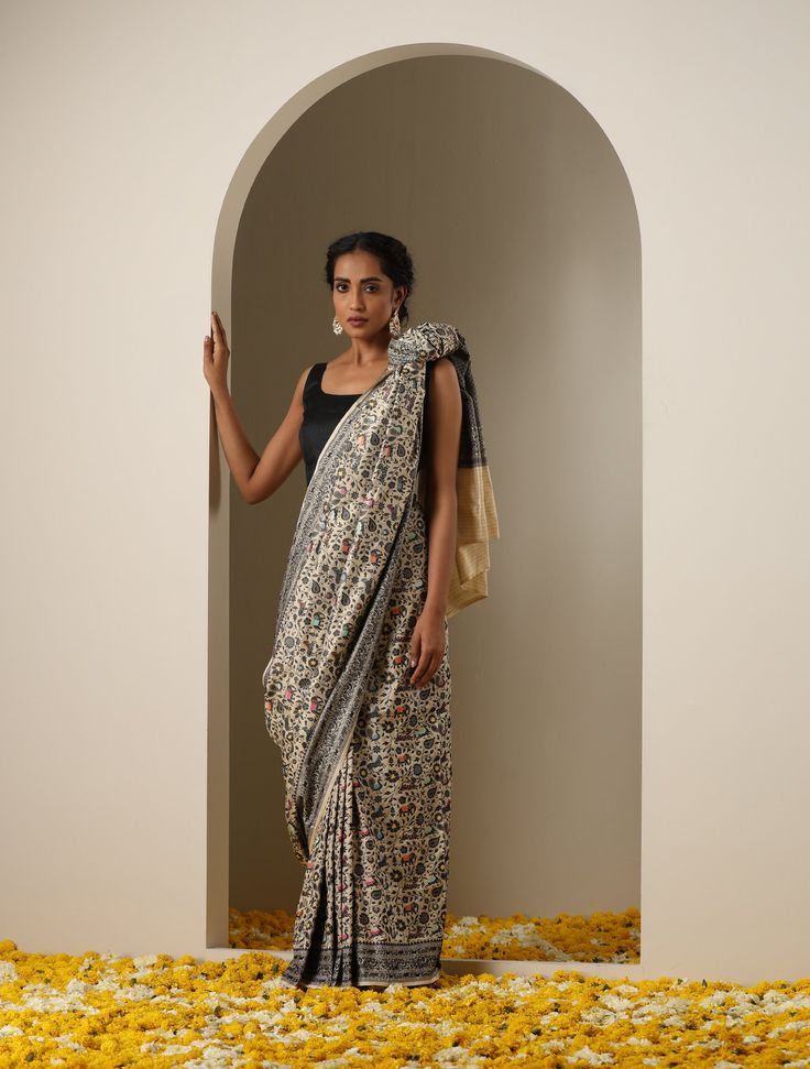 Elevate Elegance with Shikargah Collection Banarasi Silk SareeIndulge in opulence with our Shikargah Collection Banarasi Silk Saree. Inspired by regal hunting scenes, the exquisitely hand-woven Shikargah motifs come to life on luxurious Banarasi silk. Each piece is a testament to skilled craftsmanship, embodying cultural richness and timeless allure. The incorporation of Katan silk lends a touch of luxury, enhancing the texture and opulence.Our Shikargah Collection pays homage to the art of weav Transitional Brocade Pre-draped Saree, Transitional Season Brocade Pre-draped Saree, Transitional Designer Wear Pre-draped Jamawar Saree, Transitional Designer Pre-draped Jamawar Saree, Traditional Raw Silk Kalamkari Pre-draped Saree, Traditional Brocade Pre-draped Saree, Traditional Festive Wear For Diwali, Traditional Raw Silk Pre-draped Saree With Kalamkari Print, Transitional Kalamkari Pre-draped Saree