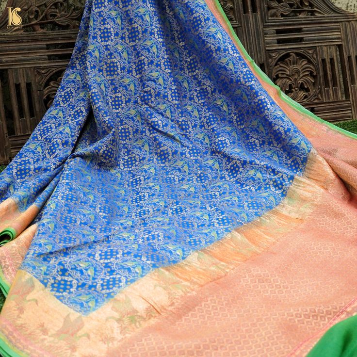 Havelock Blue Pure Georgette Banarasi Birds Saree - Khinkhwab Eid Multicolor Pre-draped Saree With Meenakari, Blue Sharara With Zari Weaving For Festivals, Blue Sharara With Traditional Drape And Zari Weaving, Festive Blue Sharara With Zari Weaving, Blue Sharara With Zari Weaving For Wedding, Anarkali Style Pre-draped Jamawar Saree, Designer Jamawar Handloom Saree, Designer Jamawar Saree With Cutdana, Blue Banarasi Silk Sharara With Cutdana Details