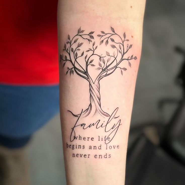 a tree tattoo on the arm that says, family there life begins and love never ends